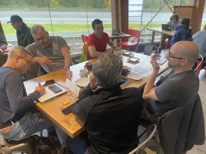 Members of the public talk about budget with Council over coffee at the Squamish Adventure Centre.